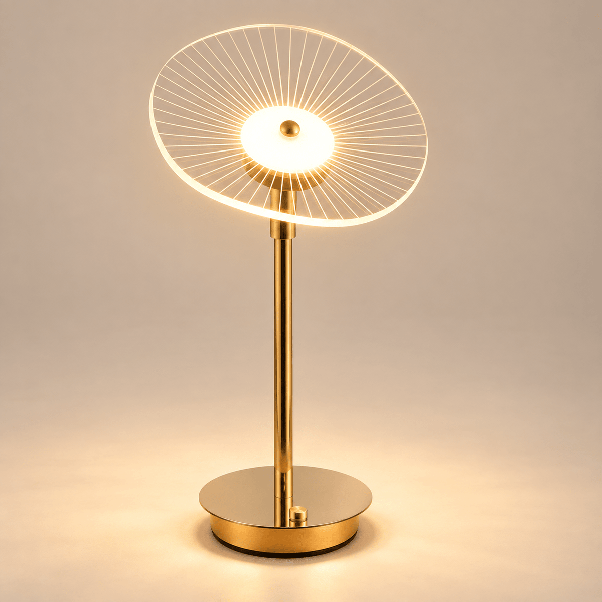 smooth circular transparent acrylic disc shade with straight radial engraved spokes, gold stem and round gold base