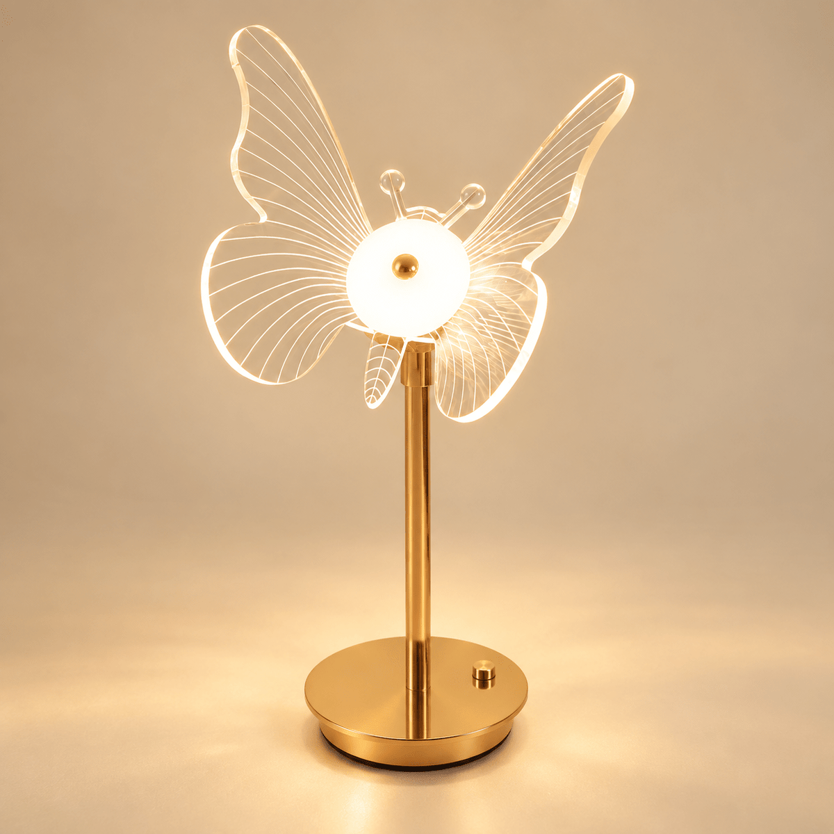 butterfly shaped transparent acrylic shade with four asymmetric wings and engraved wing veins, gold stem and round gold base