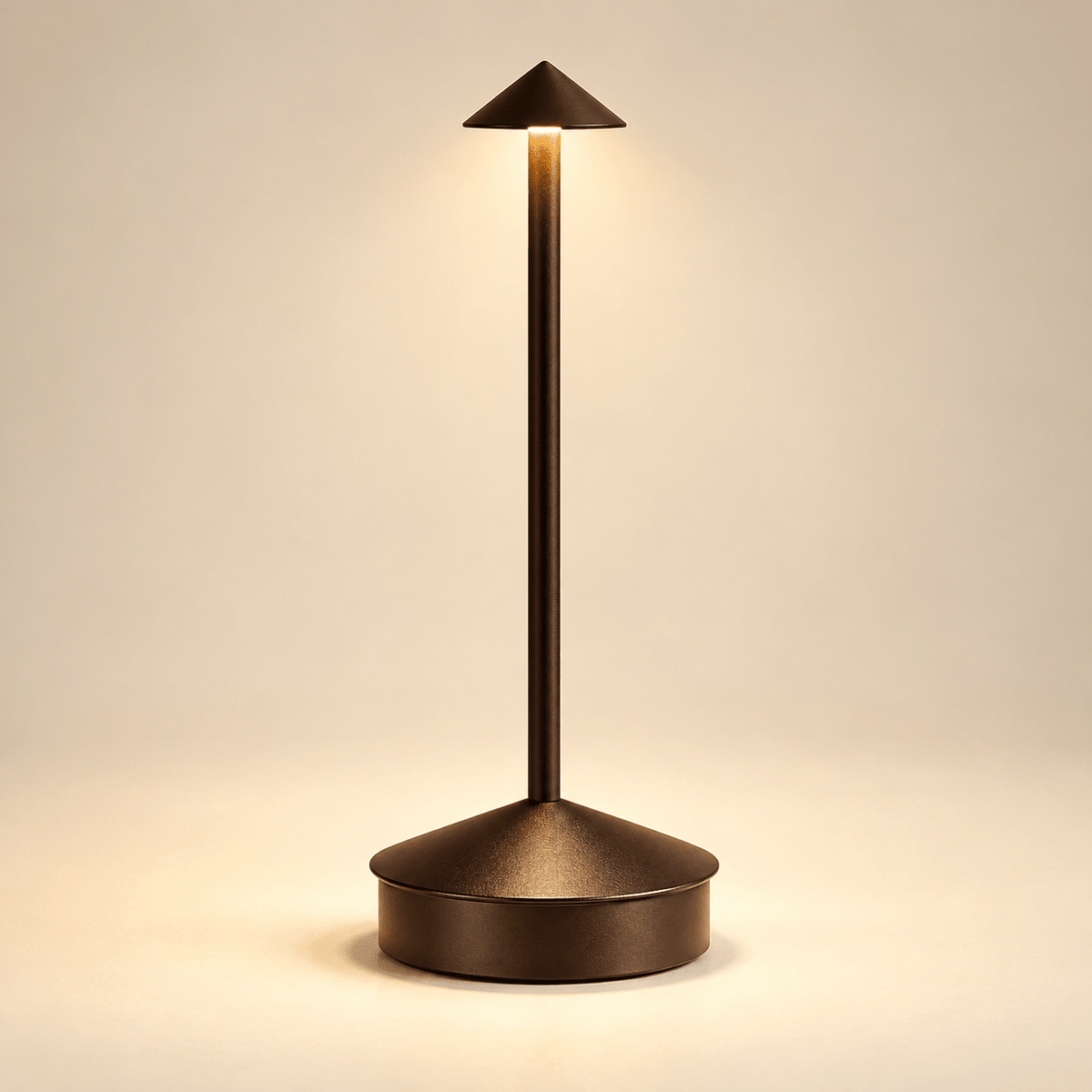 brown finish single lamp from the left side of reference, tiny low conical shade on slim straight stem with broad cylindrical base with conical top