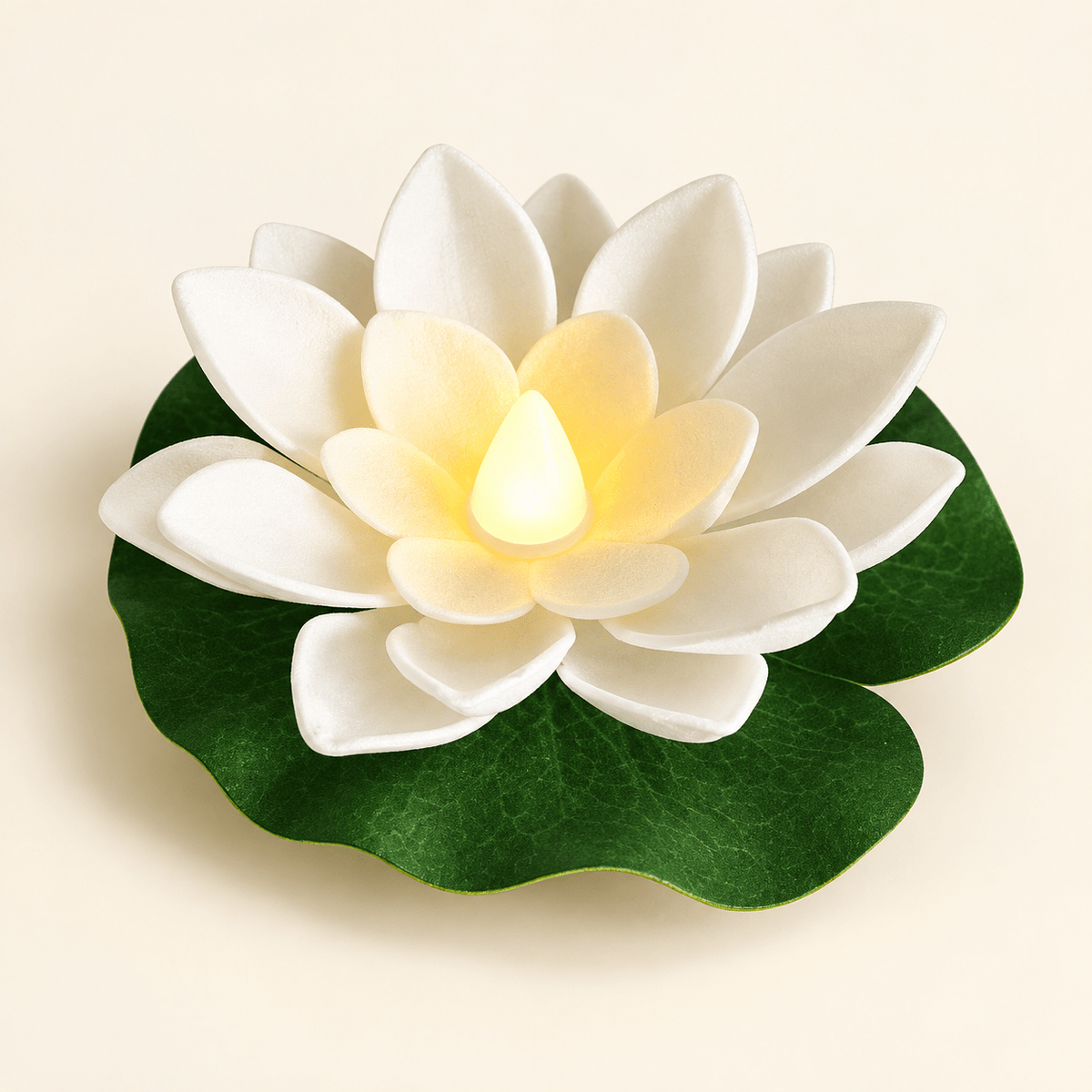 White floating lotus LED lamp on a green leaf pad