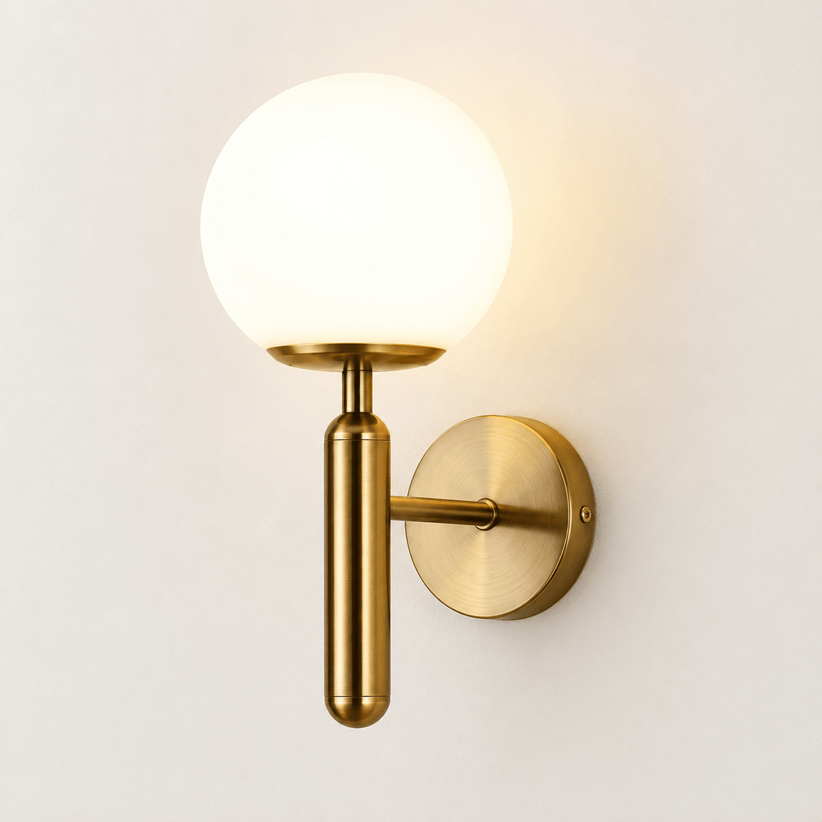 Brass glass wall sconce, clean studio view