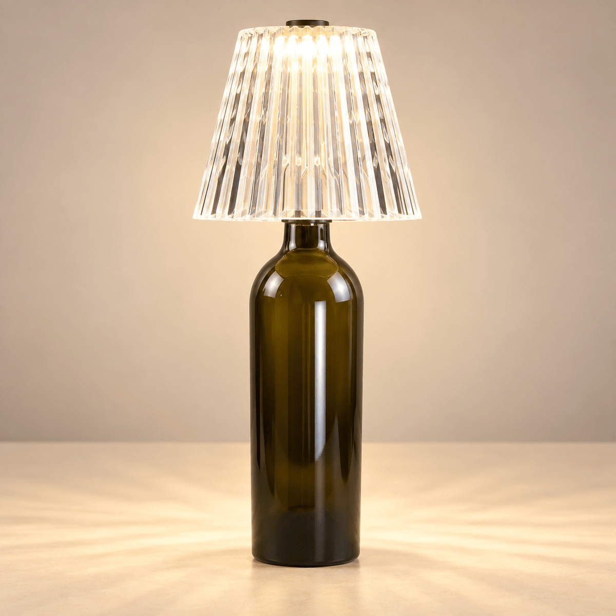 Vertically fluted acrylic wine bottle lamp shade on an unlabelled bottle