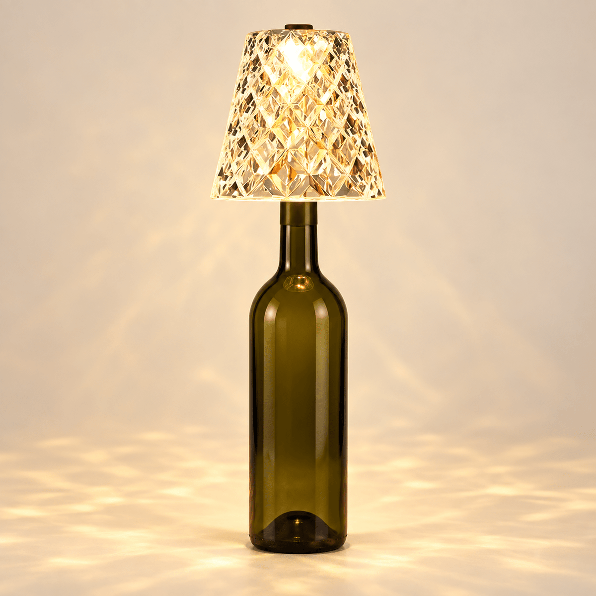Diamond-cut acrylic wine bottle lamp shade on an unlabelled bottle